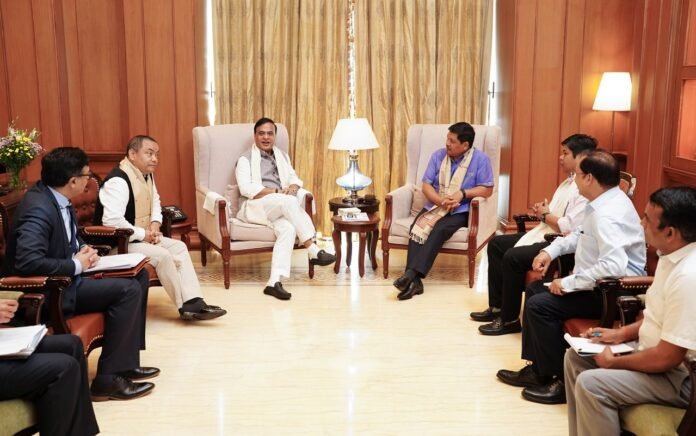 Officials from Meghalaya and Assam discussing peace and cooperative farming initiatives in the Lapangap border area