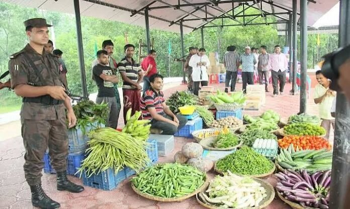 Local traders conduct business at the reopened Kamlasagar Border Haat, supporting regulated micro-trade between Tripura and Bangladesh.