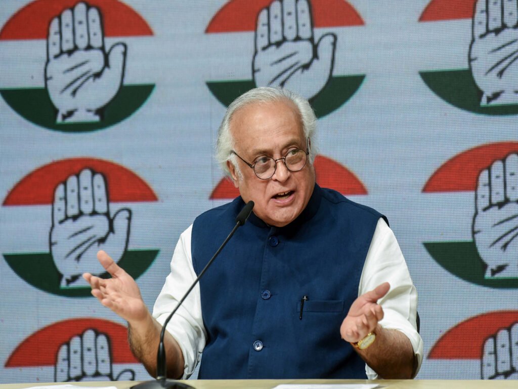 Jairam Ramesh addresses the media while discussing the fiscal implications of the VB-G RAM G rural employment framework.