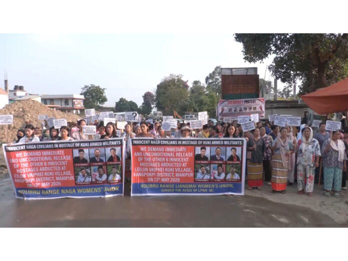 Officials from the Manipur Home Department engage in negotiations to resolve a 28-day blockade on NH-2 at Namdilong.