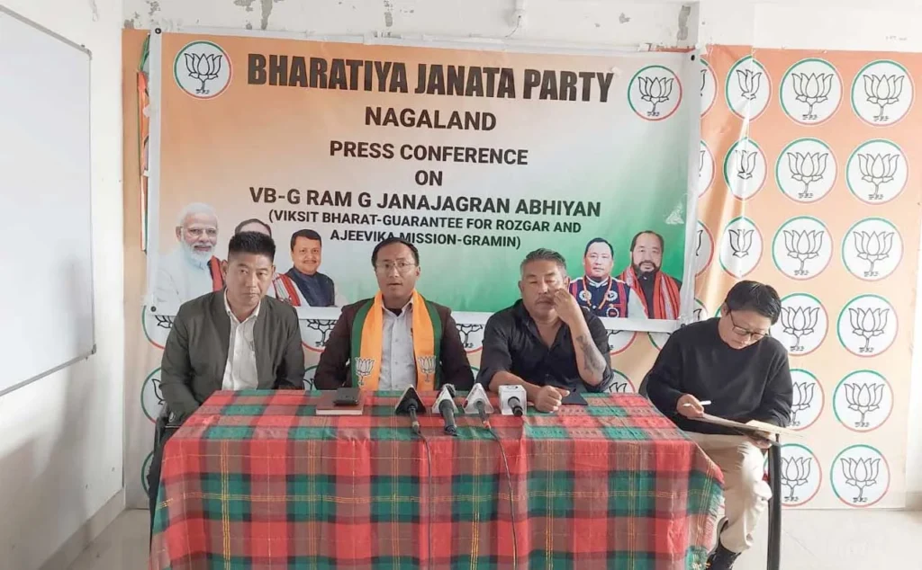### FAQs **1. What is the VB-G RAM G Act rollout Northeast?** The **VB-G RAM G Act rollout Northeast** refers to the implementation of a restructured rural employment framework in the hill districts of Manipur and Nagaland. Moreover, the new system aims to improve administrative efficiency, wage delivery, and project monitoring. **2. Which states have started implementing the new framework?** Manipur and Nagaland have officially begun implementing the framework. Furthermore, both states have launched the rollout in phases across selected hill districts to ensure smooth execution. **3. What changes does the new framework introduce?** The updated framework streamlines wage distribution, strengthens administrative oversight, improves project allocation, and enhances transparency. Consequently, authorities expect rural employment programmes to operate more efficiently. **4. Why is the VB-G RAM G Act rollout Northeast important for hill districts?** The **VB-G RAM G Act rollout Northeast** is important because rural employment programmes support livelihoods and local development in many hill districts. Additionally, the new framework aims to improve infrastructure projects while ensuring timely benefits for eligible workers. **5. How will authorities monitor the implementation of the Act?** District-level coordination committees will supervise projects, while digital monitoring systems will track programme progress. Meanwhile, state governments will continue reviewing implementation to improve accountability and strengthen rural development outcomes.