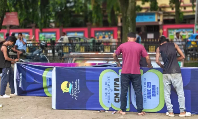 Football fans gather at Assam's FIFA Fan Park to watch a FIFA World Cup match on a giant public screen.