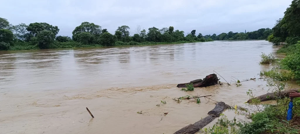 The Khowai River flows at an elevated level as Water Resources Department officials monitor conditions after the river approaches its warning mark.
