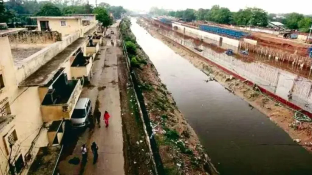 Water flows through an urban drainage channel in Agartala as discussions continue over proposals for an updated city drainage master plan.