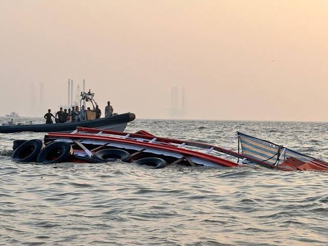 Passenger ferry boats remain docked along the Gomati River after authorities temporarily suspend river transport due to strong monsoon currents.