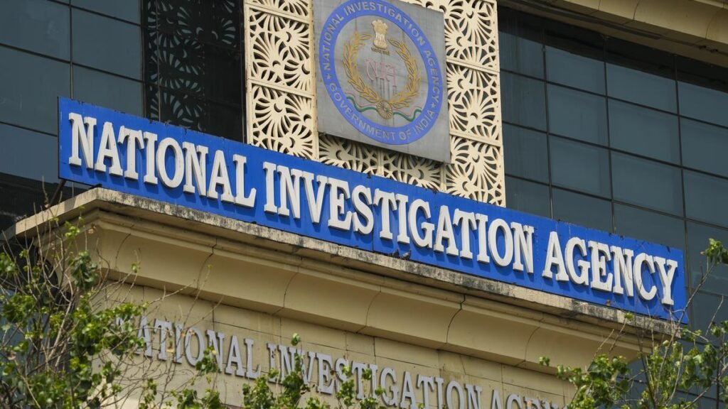 National Investigation Agency officials submit legal documents as part of a court case involving an alleged terror-conspiracy investigation.
