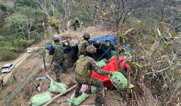 Alt Text Security personnel conduct an anti-insurgency operation while demolishing illegal bunkers in Ukhrul district, Manipur.