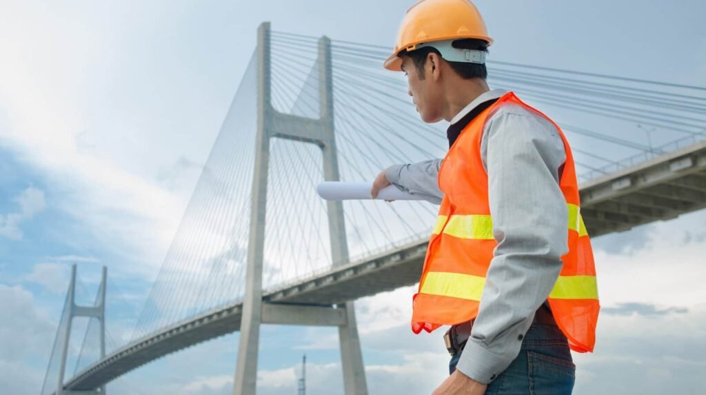 Public Works Department engineers inspect an older rural bridge during emergency structural safety checks conducted in the monsoon season.