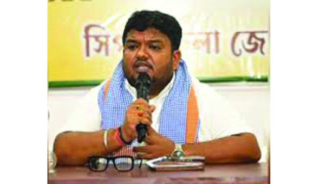 Tripura BJP President Abhishek Debroy addresses party workers during a meeting, urging unity and organizational coordination ahead of the upcoming municipal body elections.