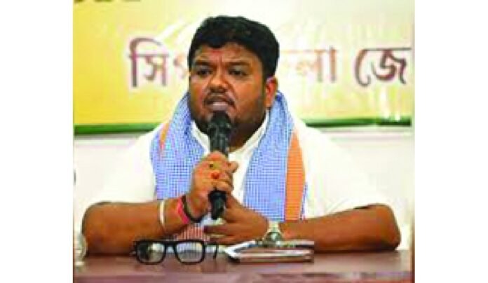 Tripura BJP President Abhishek Debroy addresses party workers during a meeting, urging unity and organizational coordination ahead of the upcoming municipal body elections.