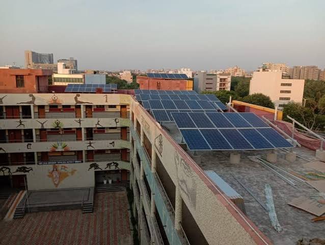 Solar panels installed at a rural school represent Arunachal Pradesh’s green-energy budget target for 100% solar-powered schools.