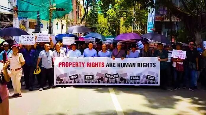 Protesters gather in Aizawl for an August 11 rally opposing restrictions under India's Foreign Contribution Regulation Act.