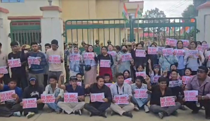 Students and activists block major roads in Imphal during a “No NRC, No Census” protest demanding citizenship verification before the national Census.