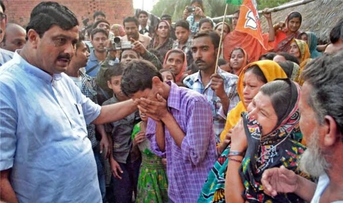 BJP workers receive hospital treatment after a reported political clash in Jolaibari ahead of the TTAADC Village Committee polls.