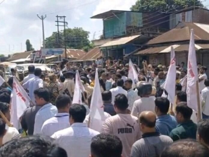 Escort vehicle accompanying former Tripura Chief Minister Manik Sarkar was allegedly damaged during a protest at Kalibazar in Bamutia.