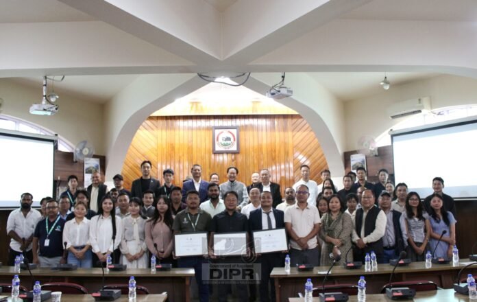 Electricity consumers and regulatory officials participating in a public hearing at the NERC headquarters in Kohima
