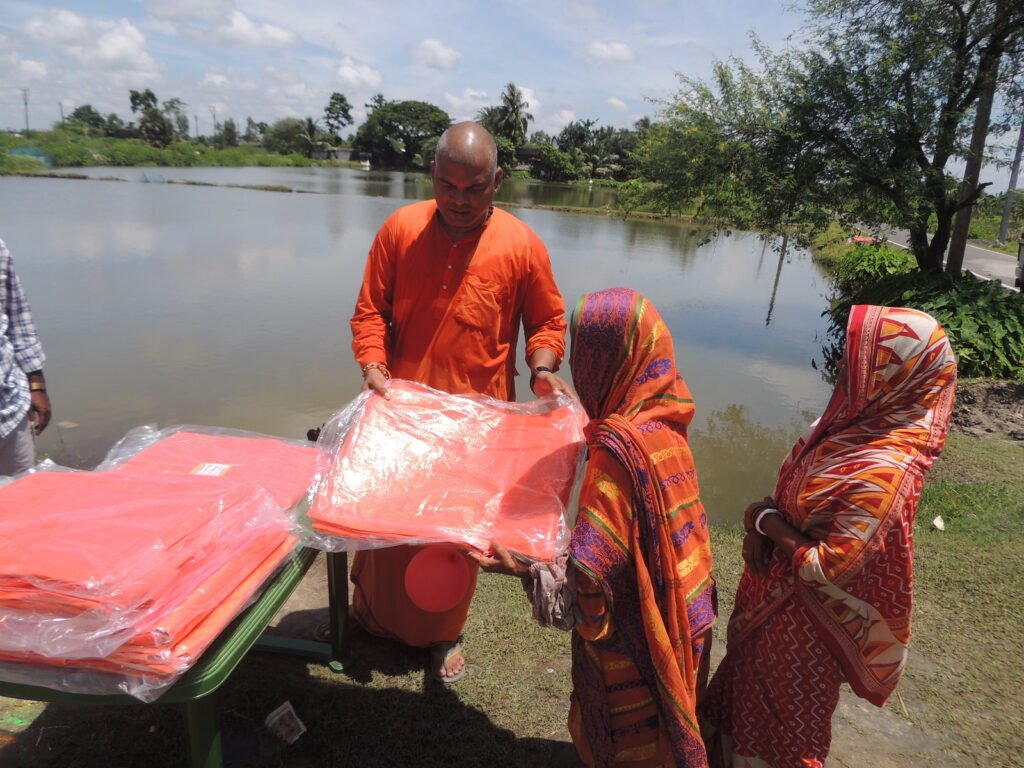 Flood-affected families awaiting rehabilitation assistance as political parties debate the distribution of relief funds.