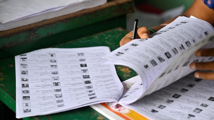 Voters and election officials preparing for Village Committee elections across Tripura.