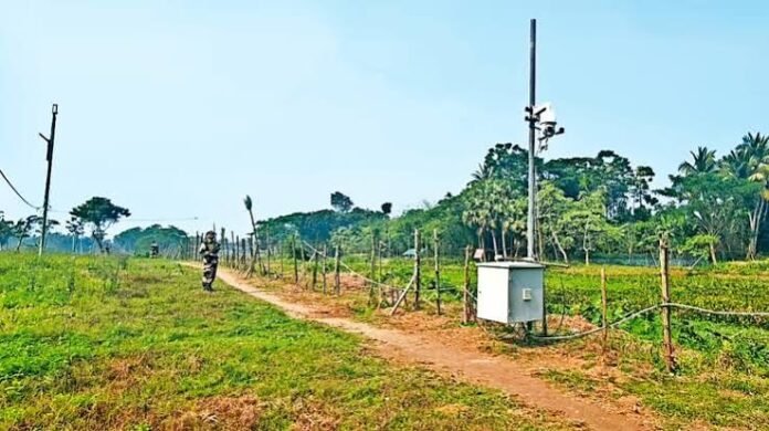 BSF personnel monitoring fencing and surveillance systems along the India-Bangladesh international border